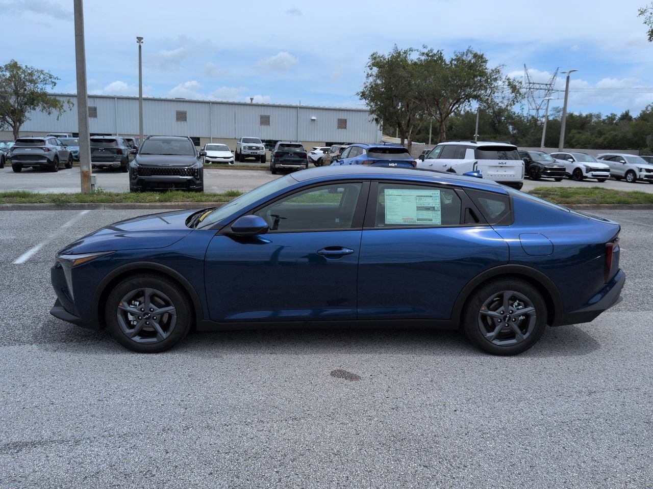 New 2026 Deep Sea Blue Kia LXS image 8