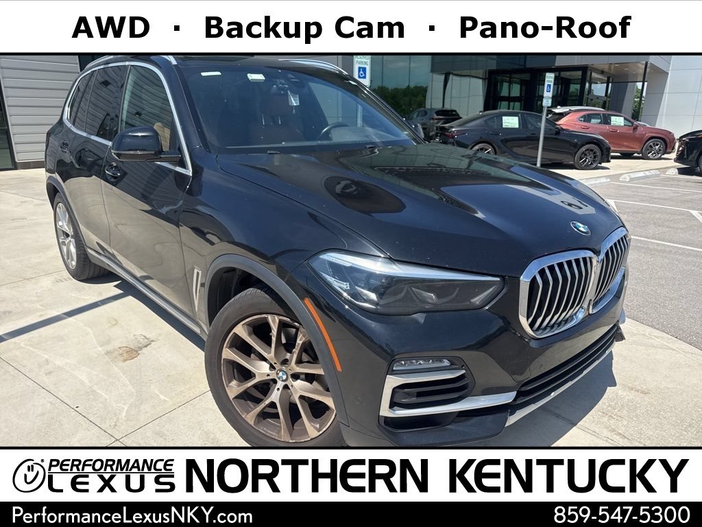 Used 2019 Black Sapphire Metallic BMW xDrive40i image 1