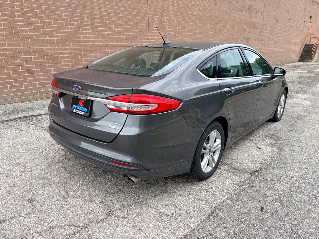Used 2018 Magnetic Metallic Ford SE image 5