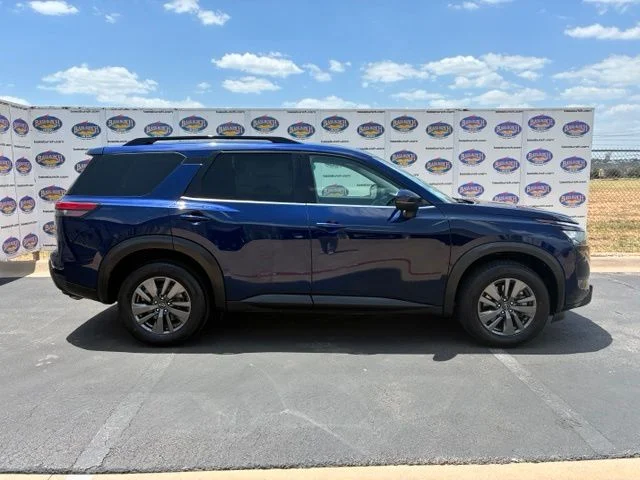 Certified Used 2024 Deep Ocean Blue Pearl Nissan SV image 1