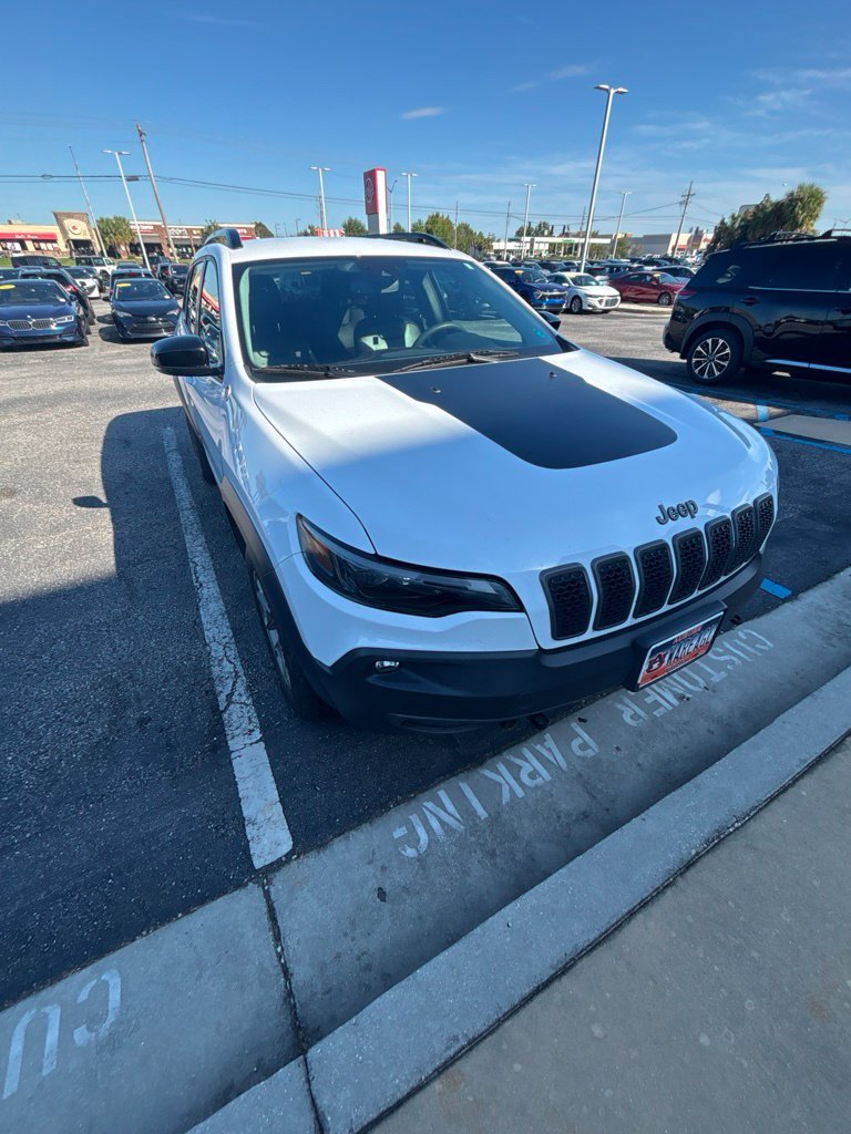 Used 2022 Bright White Clearcoat Jeep Trailhawk image 1