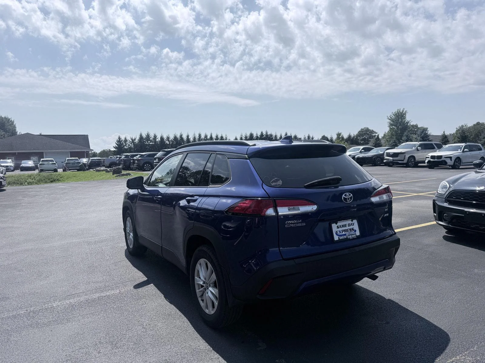 Used 2023 Blue Crush Metallic Toyota LE image 5