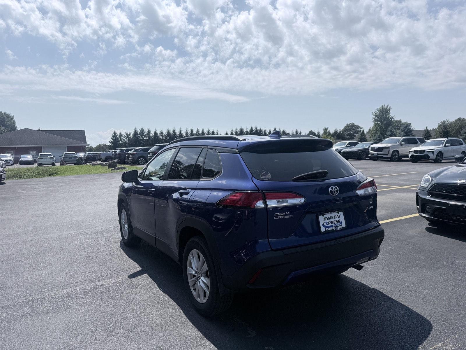 Used 2023 Blue Crush Metallic Toyota LE image 5
