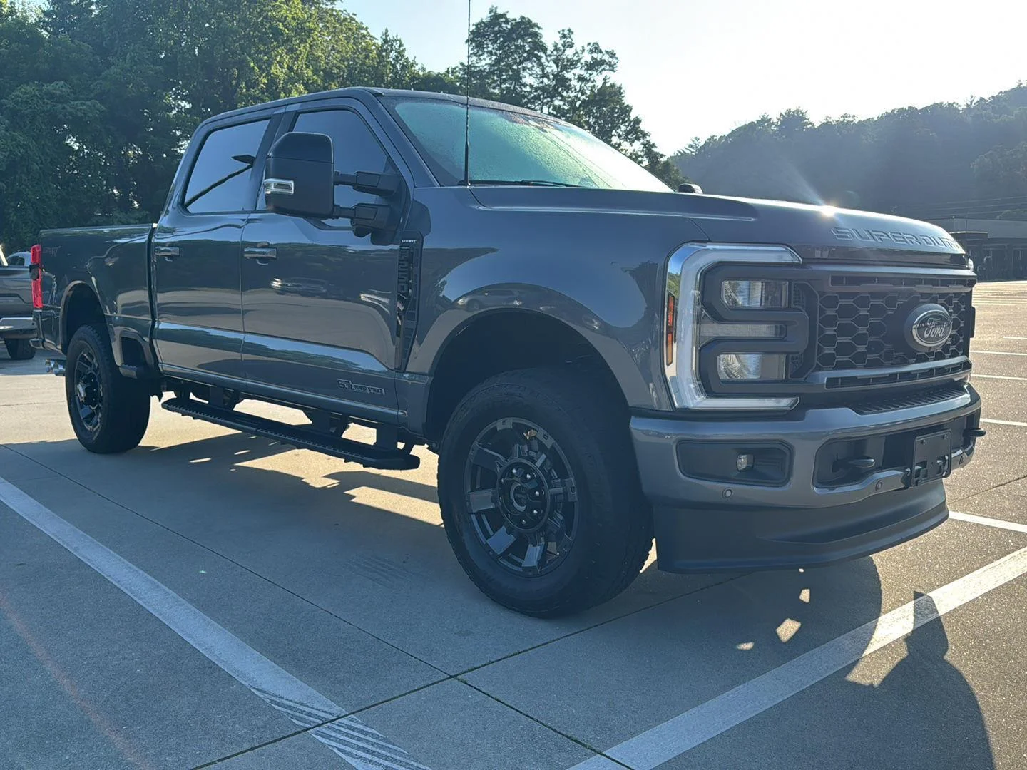 Used 2024 Carbonized Gray Metallic Ford LARIAT image 1