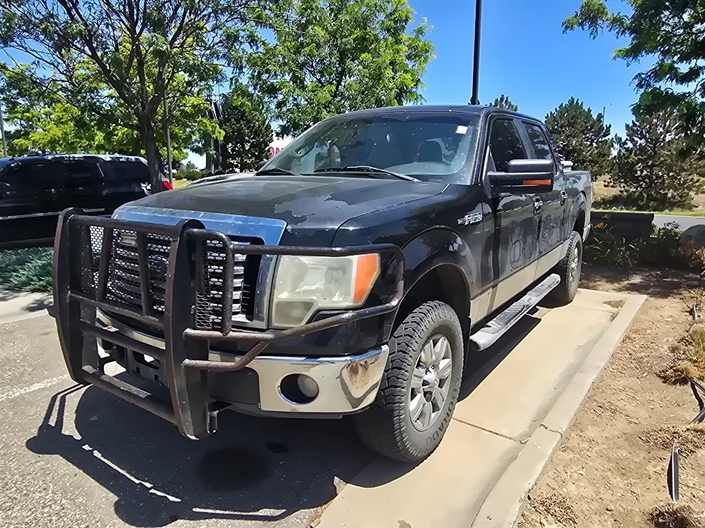Used 2011 Tuxedo Black Metallic Ford XLT image 11