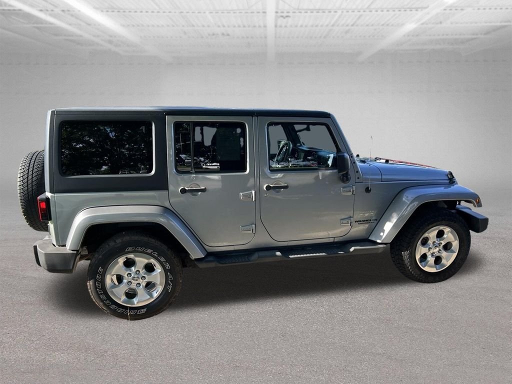 Used 2014 Gray Jeep Unlimited Sahara image 4