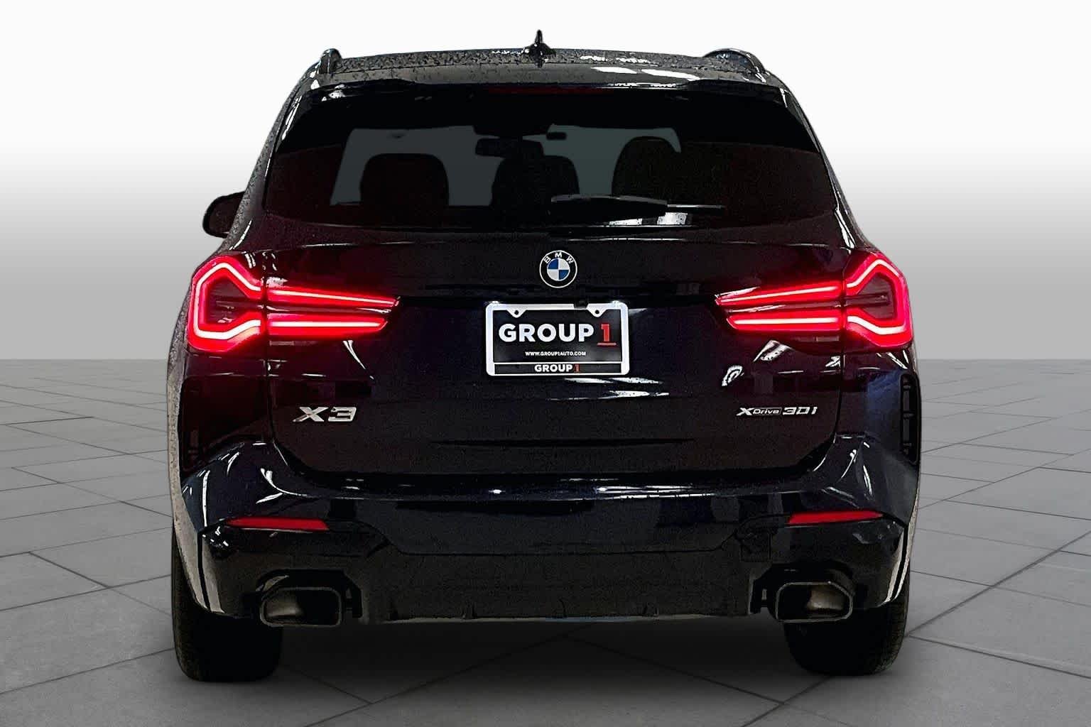 Used 2024 Carbon Black Metallic BMW xDrive30i image 4