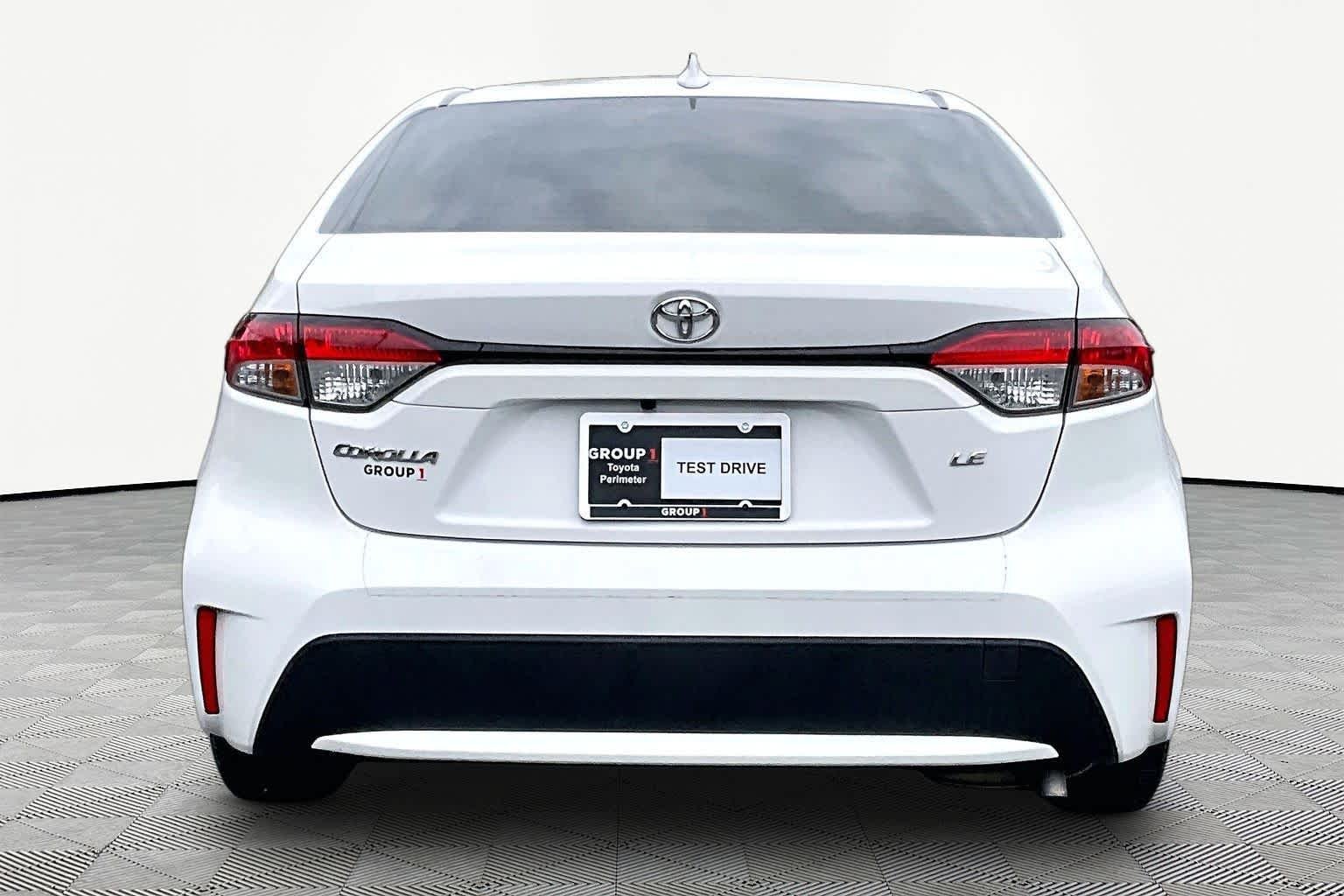Used 2021 Super White Toyota LE image 5