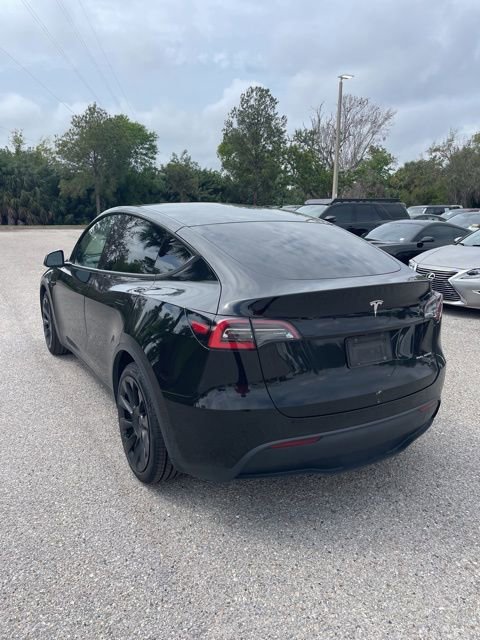 Used 2021 Tesla Model Y Long Range with VIN 5YJYGDEEXMF100074 for sale in Sarasota, FL