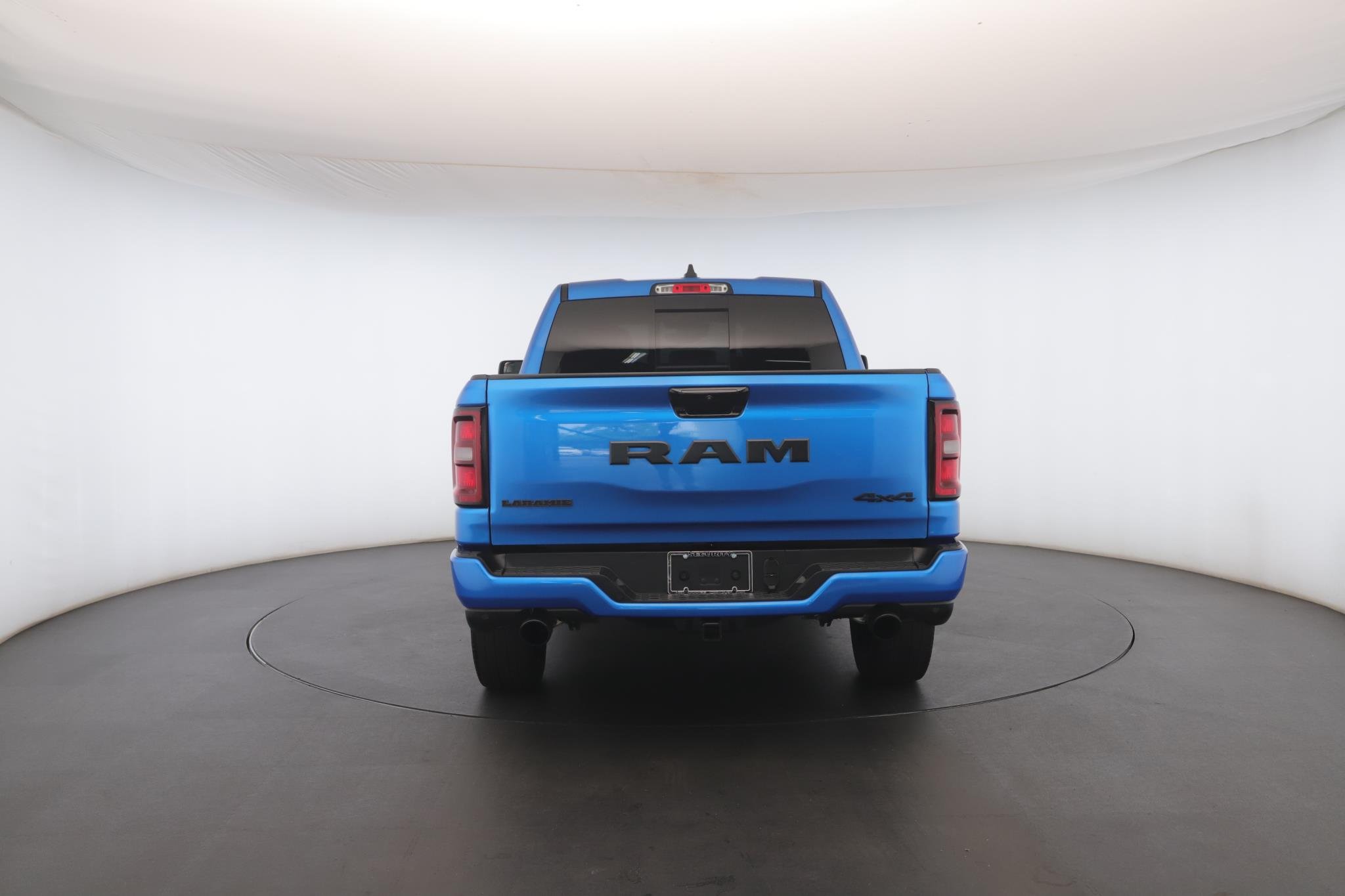 Used 2025 Hydro Blue Pearlcoat Ram Laramie 4x4 Crew Cab 5