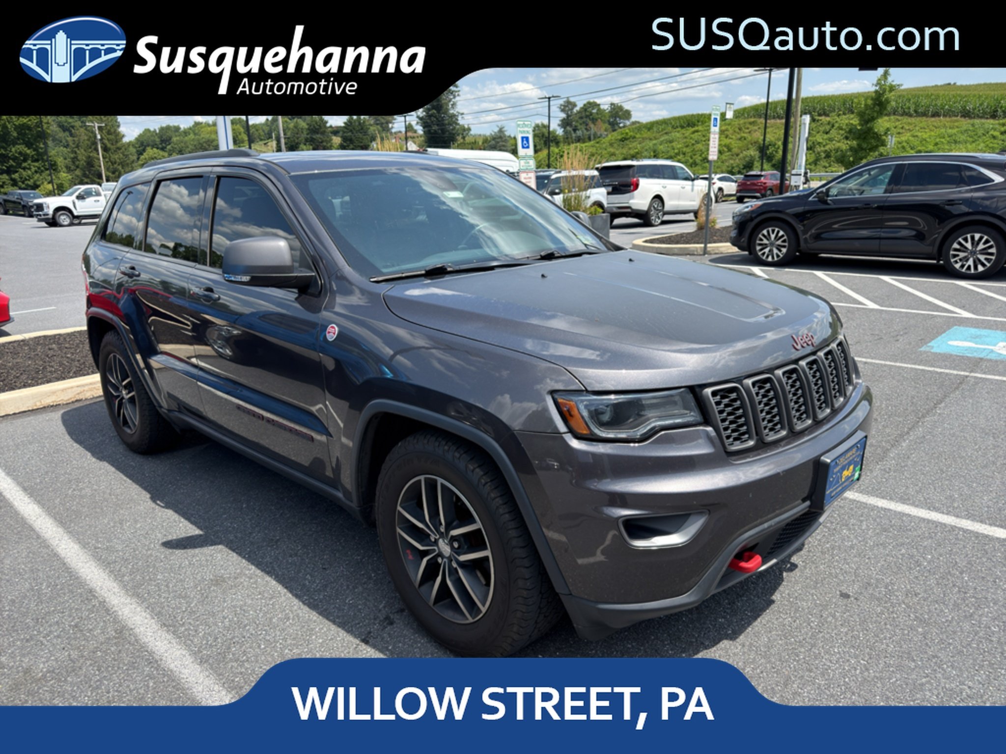 Used 2017 Granite Crystal Clearcoat Metallic Jeep Trailhawk image 1