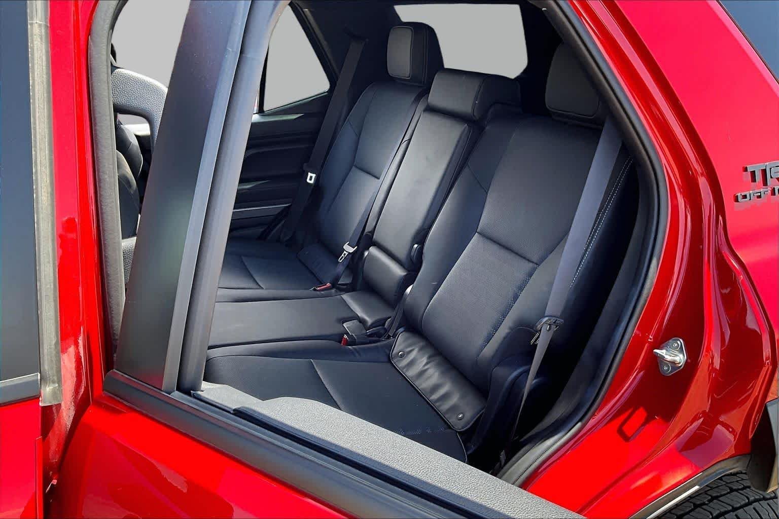 Used 2025 Supersonic Red Toyota Hybrid TRD Off Road Premium image 18