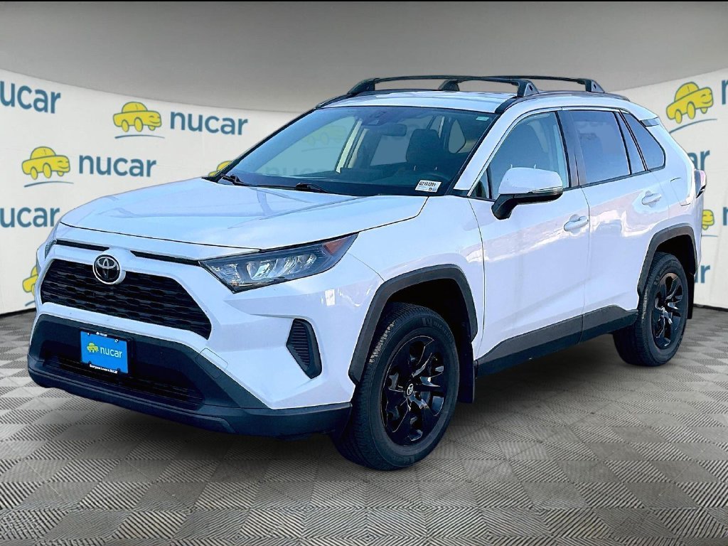 Used 2021 Super White Toyota LE image 3