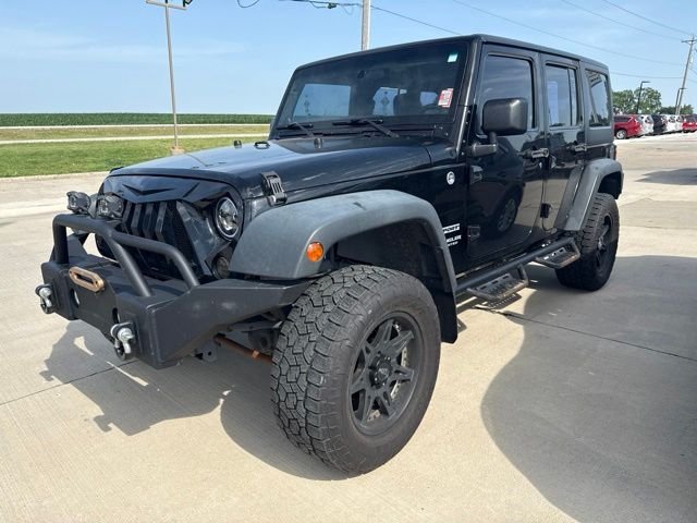 Used 2013 Black Jeep Unlimited Sport image 2