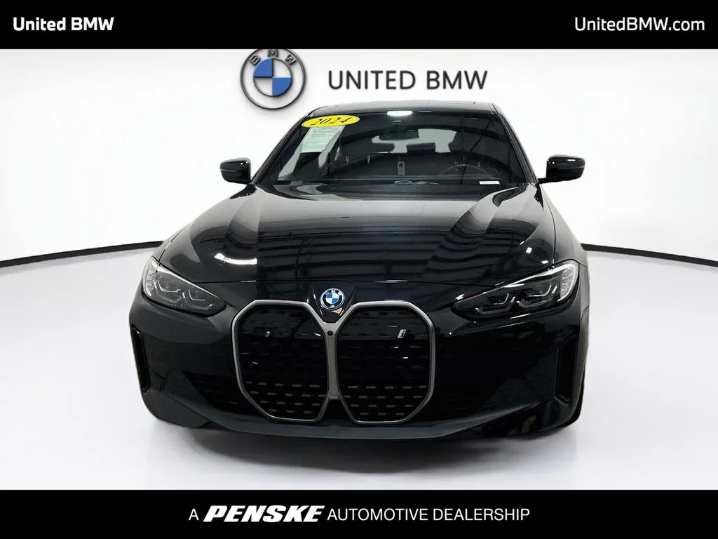 Certified Used 2024 Black Sapphire Metallic BMW eDrive40 image 2
