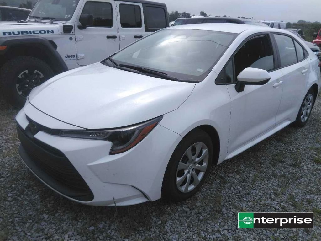 Used 2024 White Toyota LE image 2