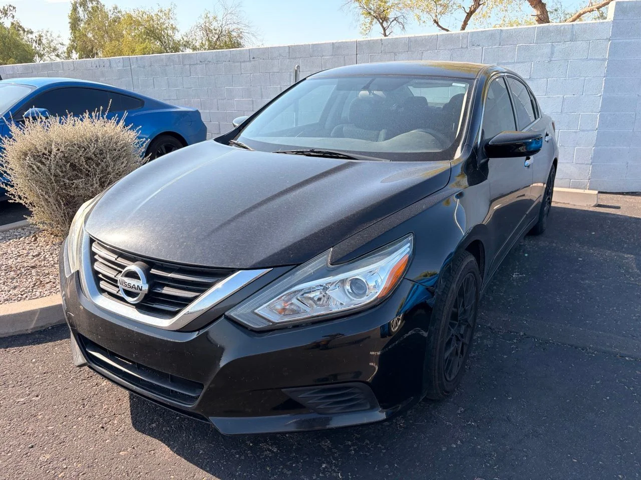 Used 2018 Super Black Clearcoat Nissan 2.5 S image 1