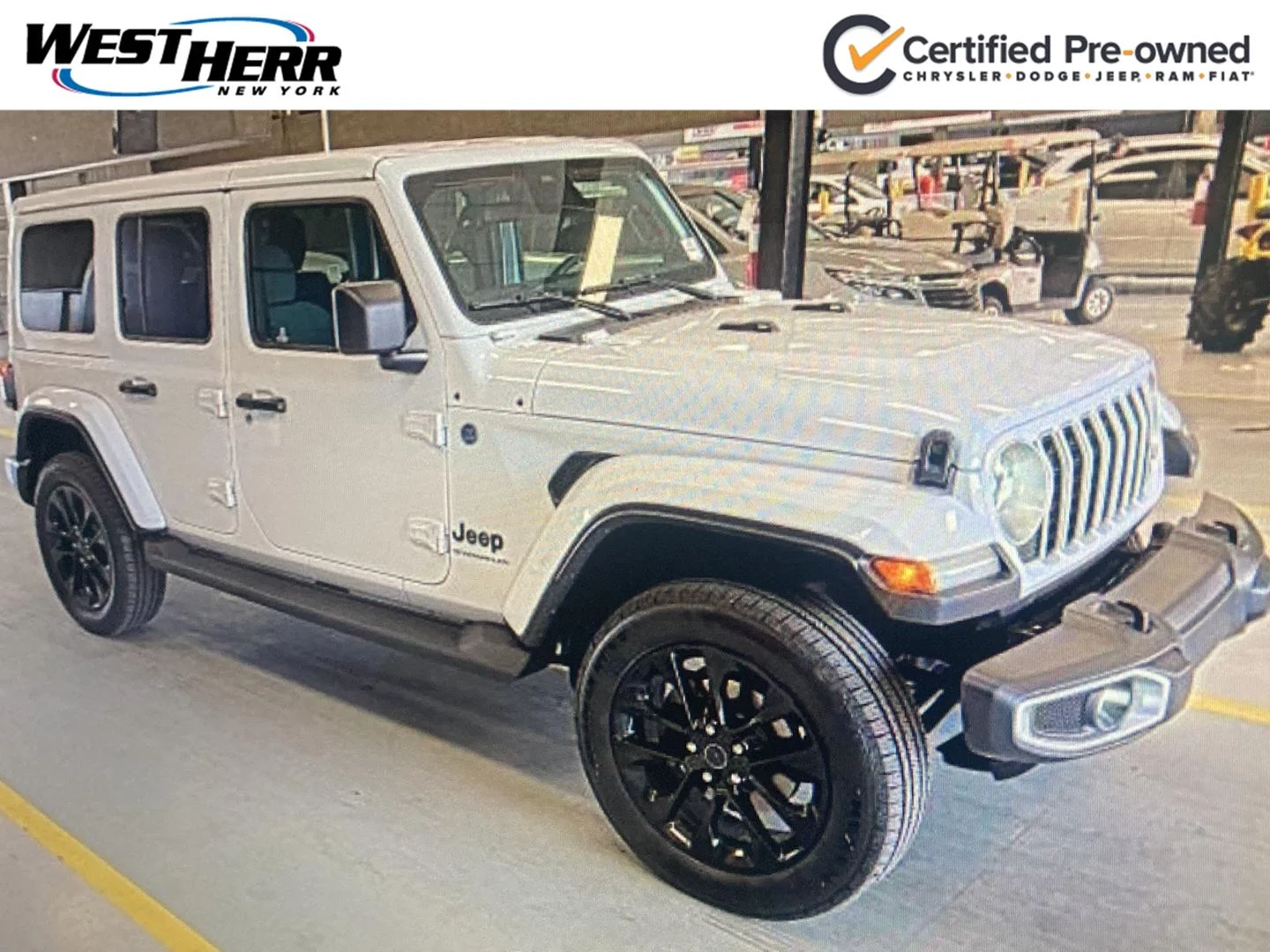 Used 2025 Bright White Clearcoat Jeep Sahara image 1