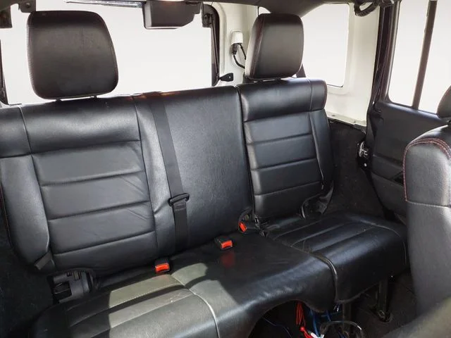 Used 2012 Black Jeep Unlimited Sahara Altitude image 13