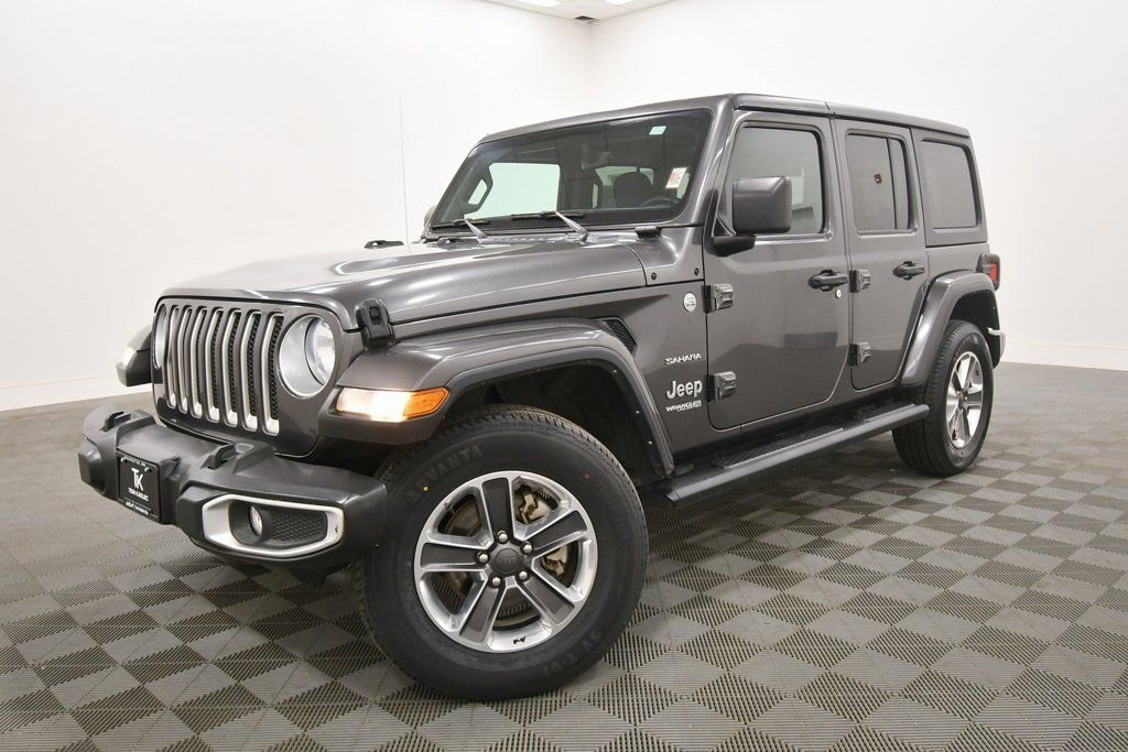 Used 2022 Jeep Wrangler Unlimited Sahara with VIN 1C4HJXEN7NW239742 for sale in Rochester, Minnesota