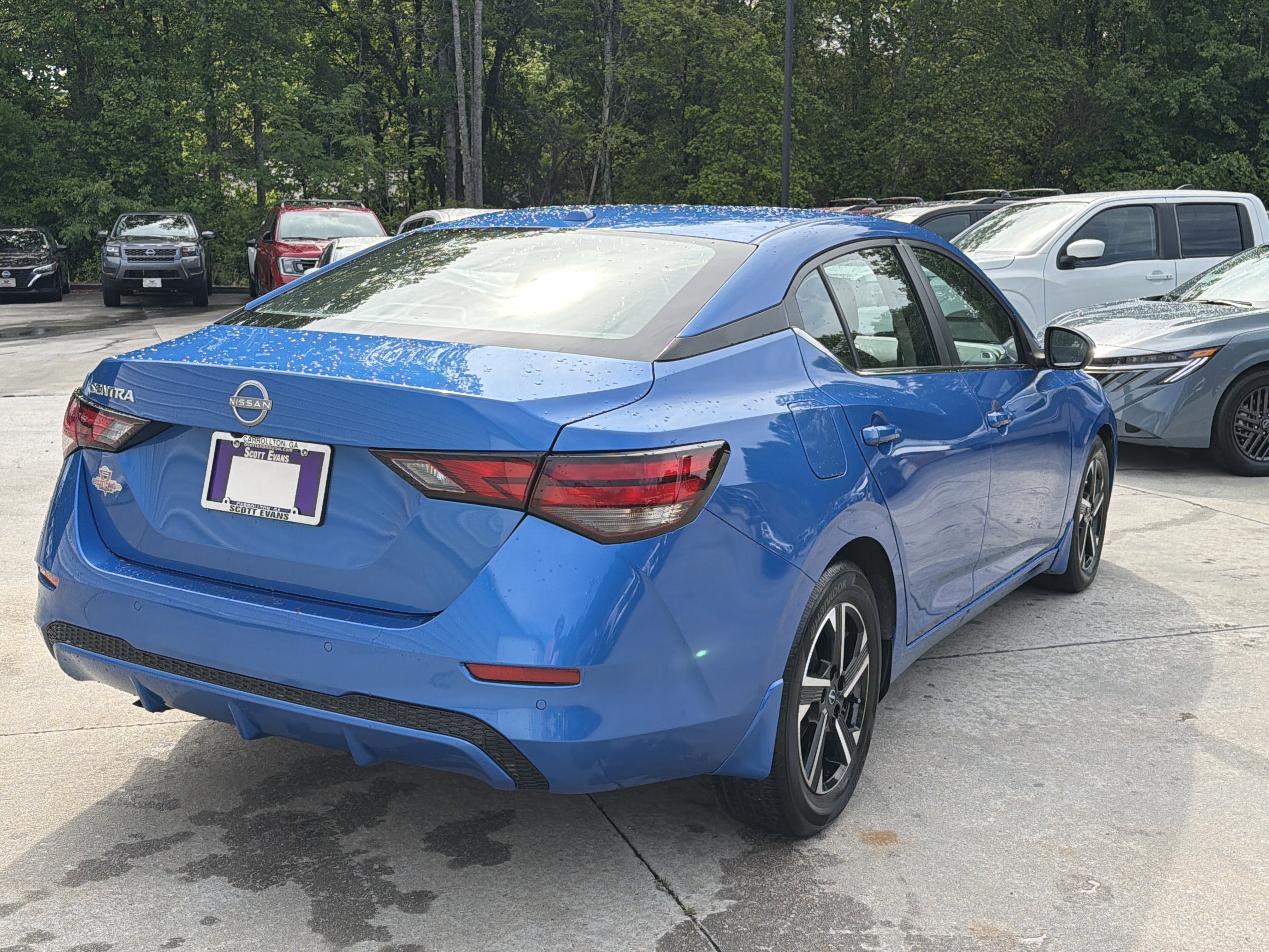 Used 2025 Electric Blue Metallic Nissan SV image 8