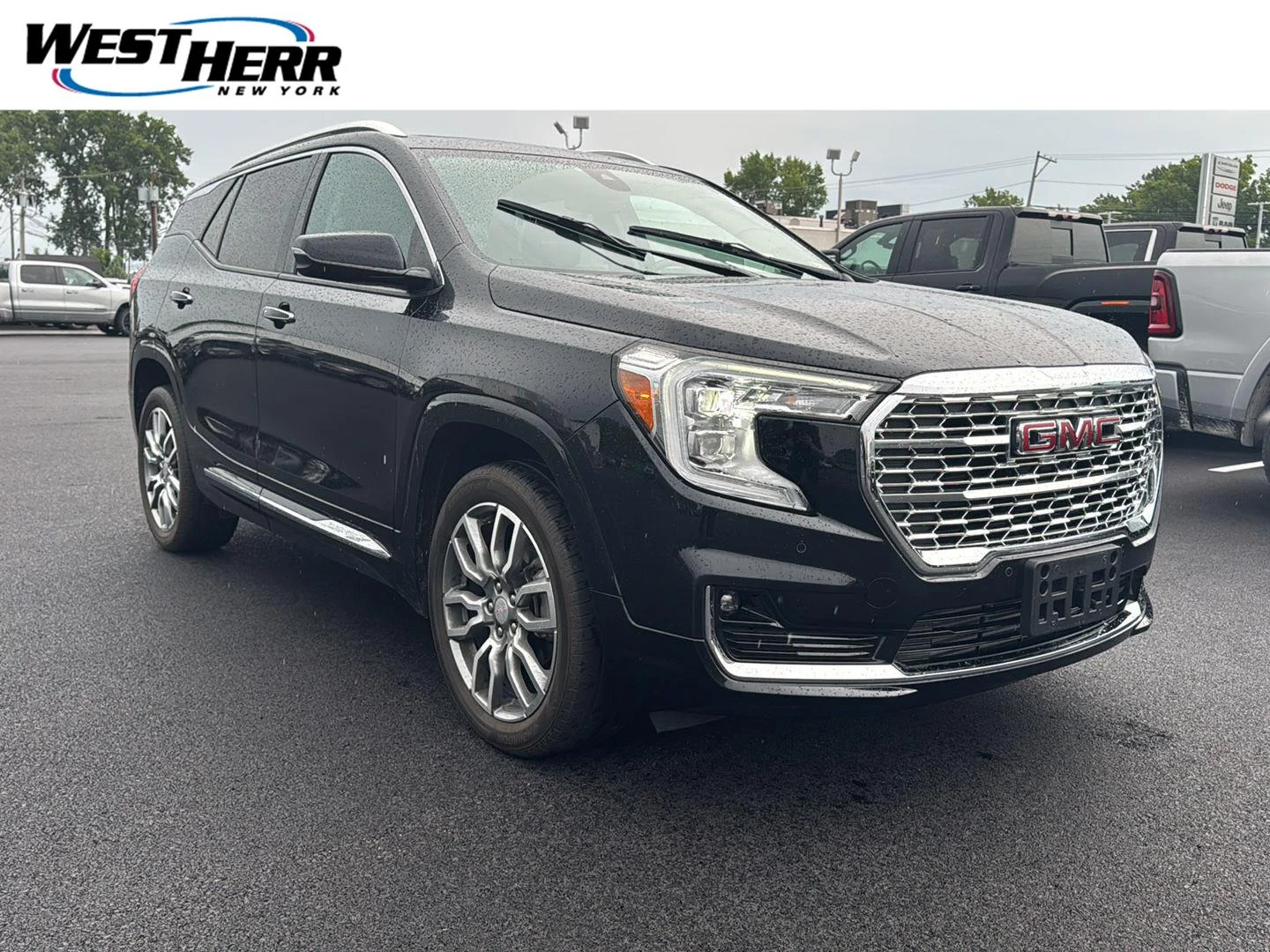 Used 2024 Ebony Twilight Metallic GMC Denali image 1