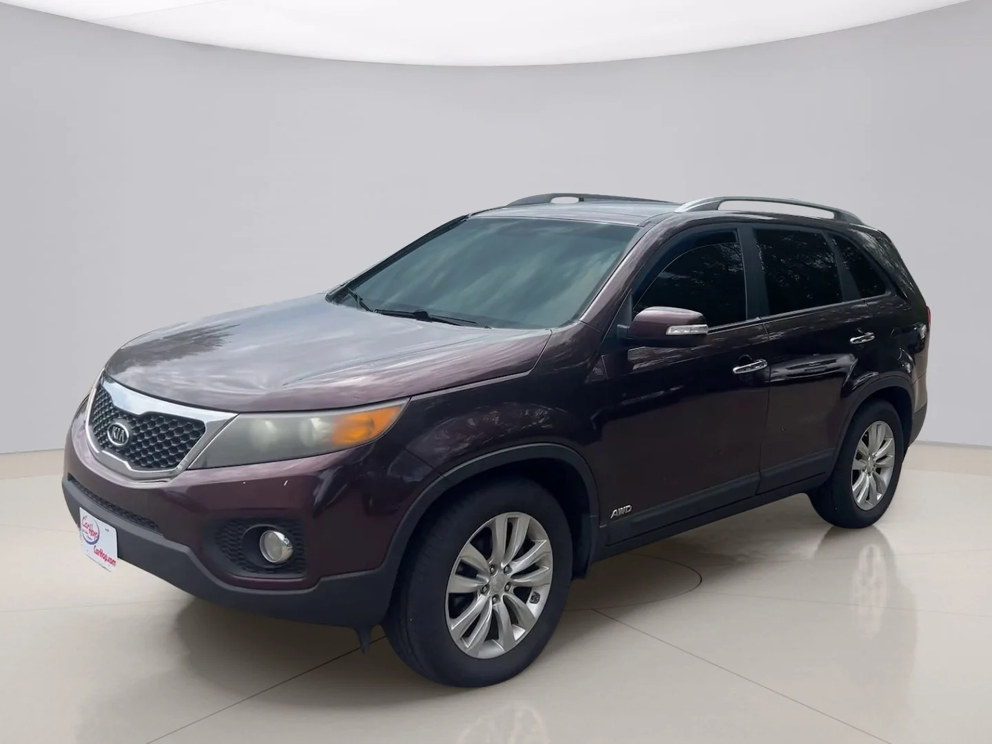 Used 2011 Maroon Kia EX image 1