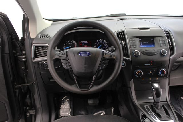 Used 2016 Magnetic Metallic Ford SE image 23