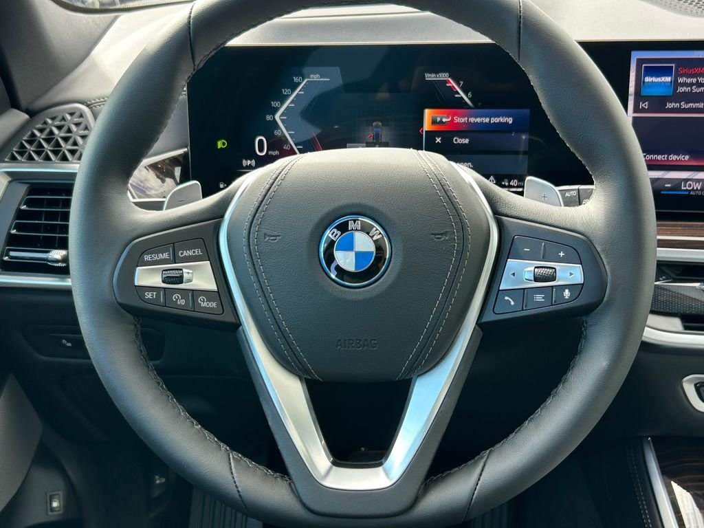 New 2026 Manhattan Green Metallic BMW xDrive50e image 18
