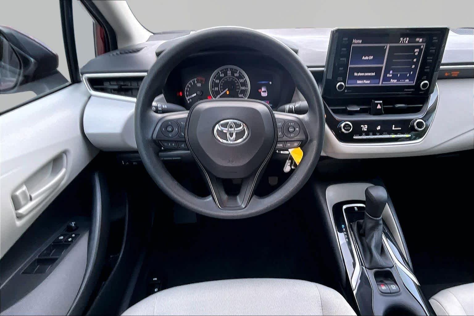 Used 2022 Ruby Flare Pearl Toyota LE image 6