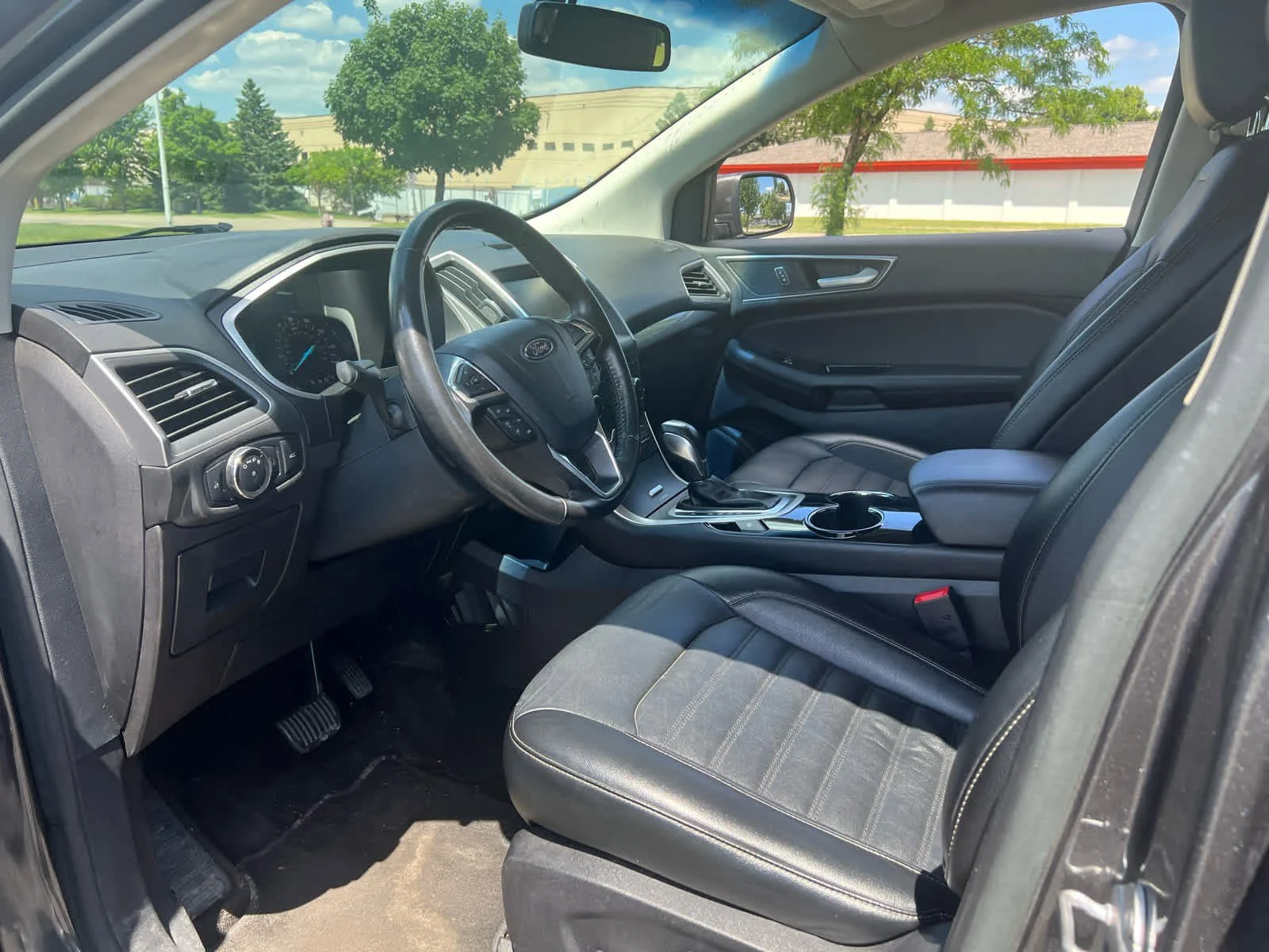 Used 2015 Magnetic Metallic Ford SEL image 9