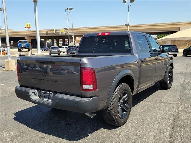Used 2024 Granite Crystal Metallic Clearcoat RAM SLT 4x2 Crew Cab 5.6 ft. box 140 in. WB image 3