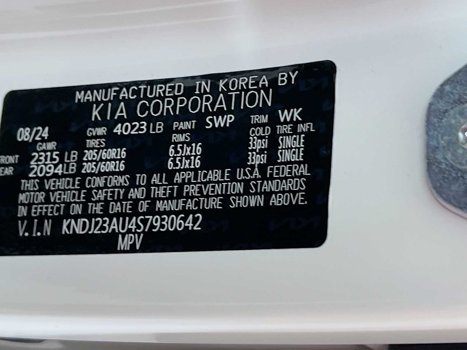 Used 2025 Snow White Pearl Kia LX image 30