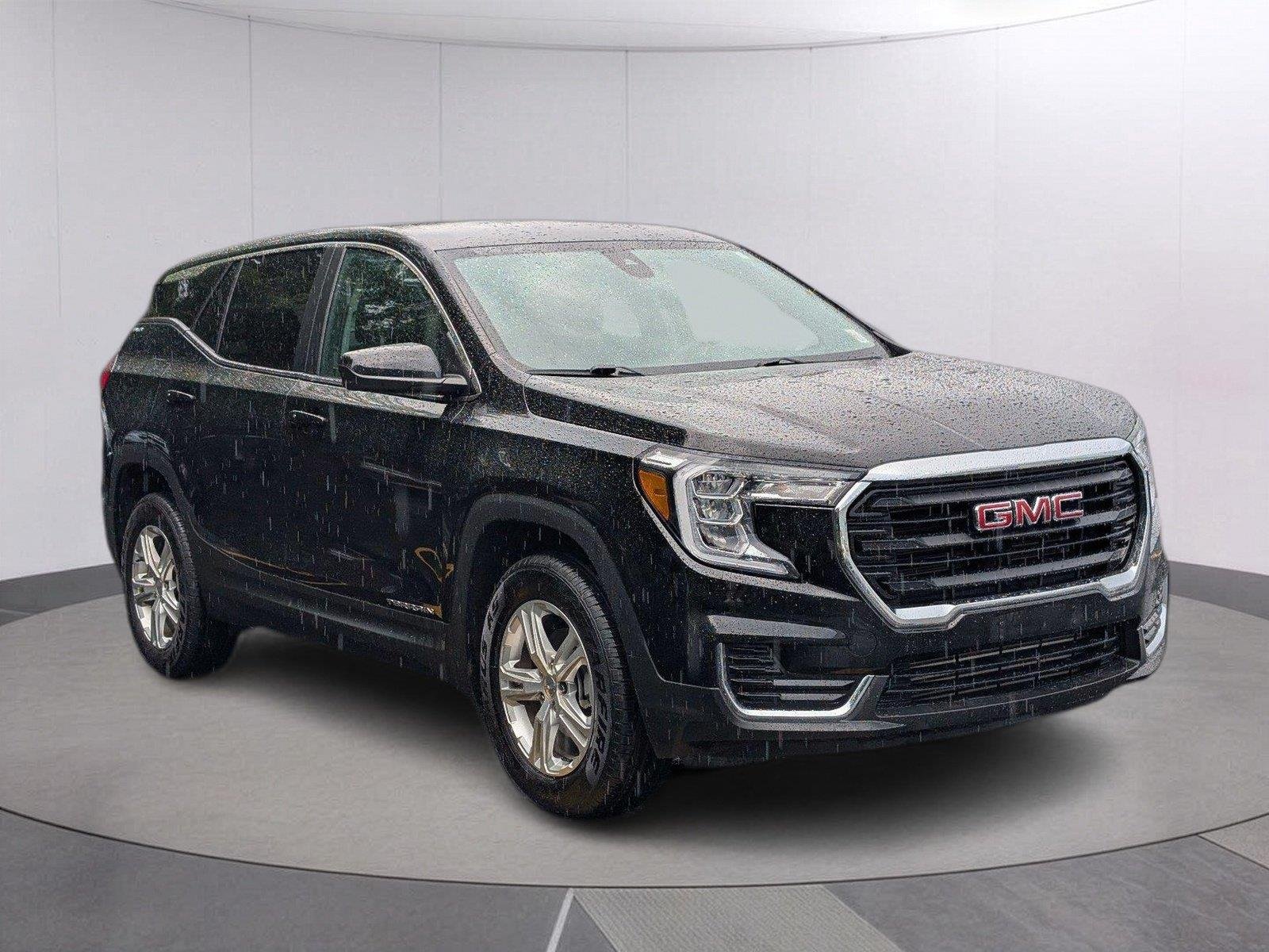 Used 2024 Ebony Twilight Metallic GMC SLE image 7