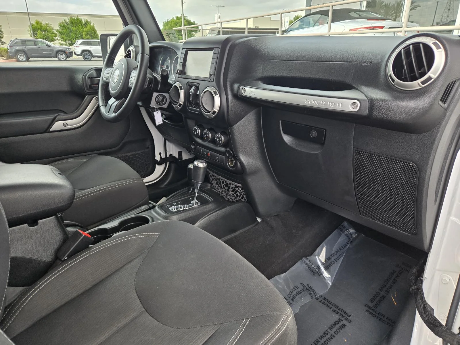 Used 2018 Bright White Clearcoat Jeep Sahara 4x4 image 25