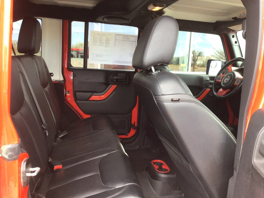 Used 2014 Red Jeep Unlimited Sahara image 7