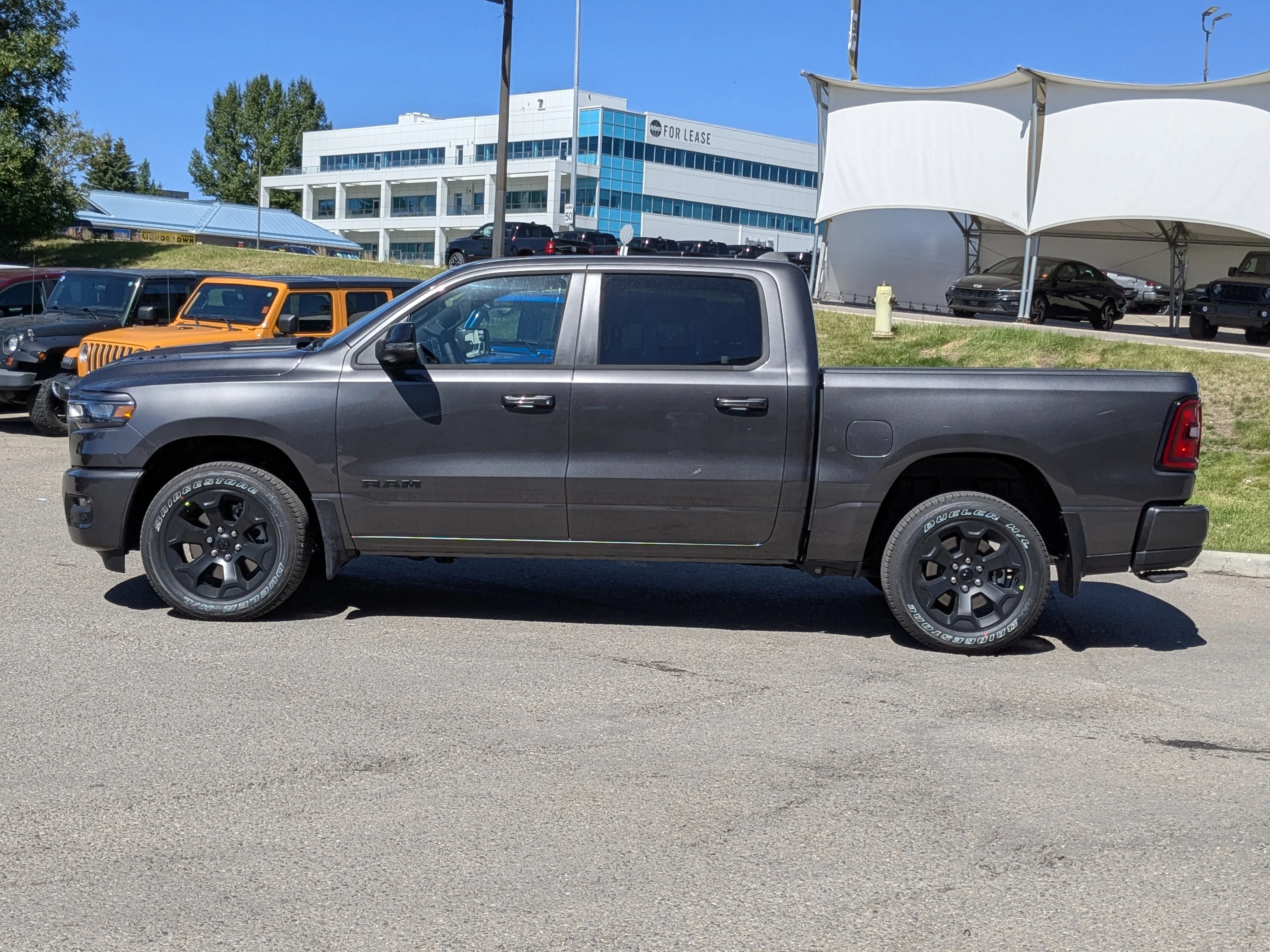 New 2026 Grey RAM Sport - Bed Utility Grp - Power Tailgate - 14.4 Display - Pano Sunroof & Tons More! image 4