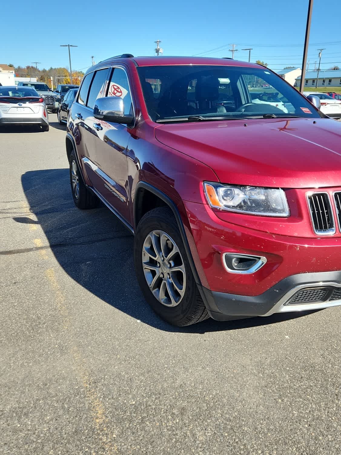 Used 2014 Deep Cherry Red Crystal Pearlcoat Jeep Limited image 2