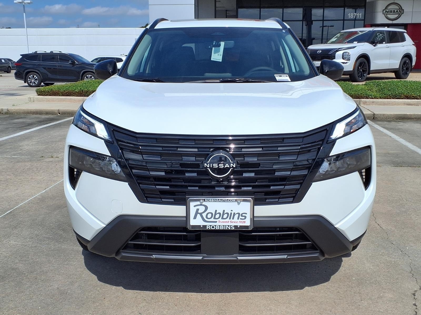 2026 Nissan Rogue Dark Armor™ White at Robbins Nissan
