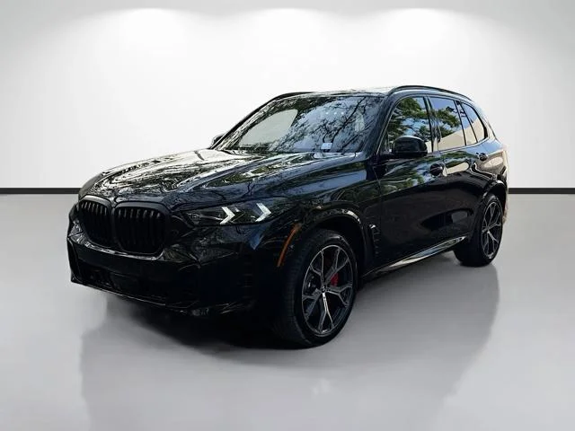 New 2026 Black Sapphire Metallic BMW xDrive50e image 7