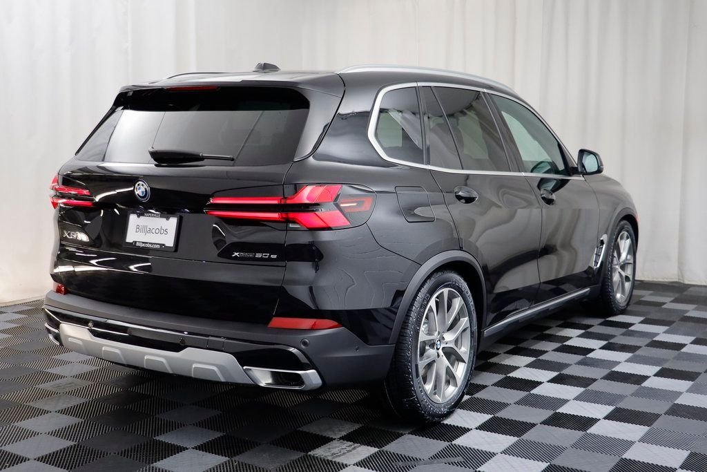 New 2026 Black Sapphire Metallic BMW xDrive50e image 16