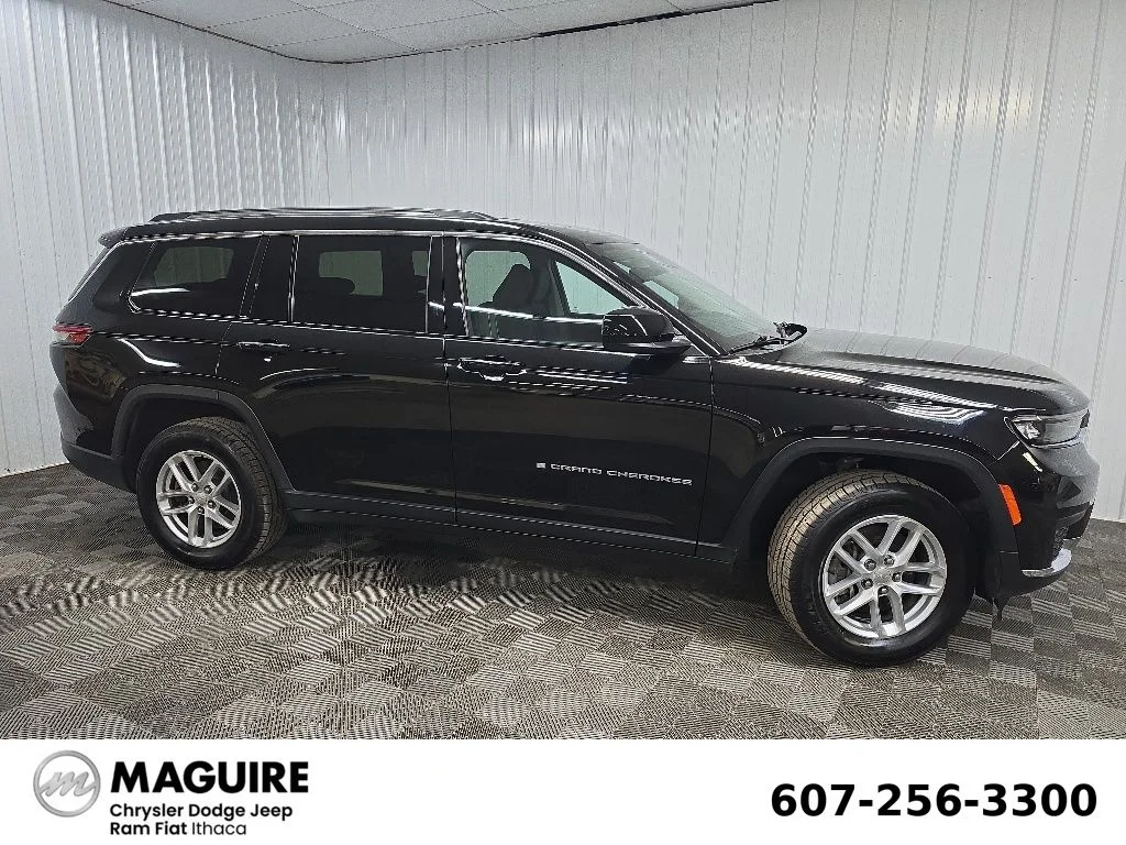 Used 2024 Black Jeep Laredo image 1