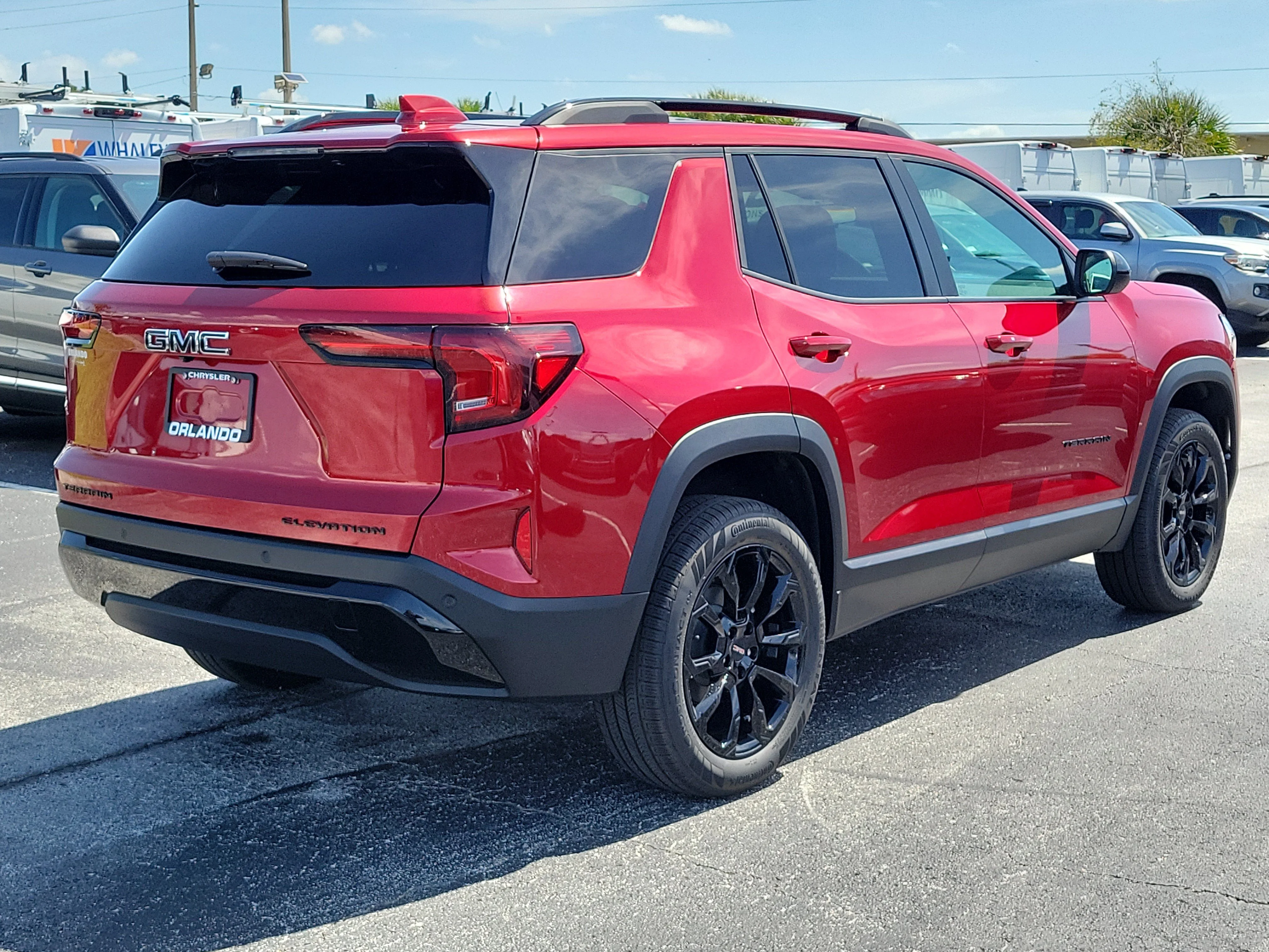 Used 2026 Volcanic Red Tintcoat GMC FWD Elevation image 7