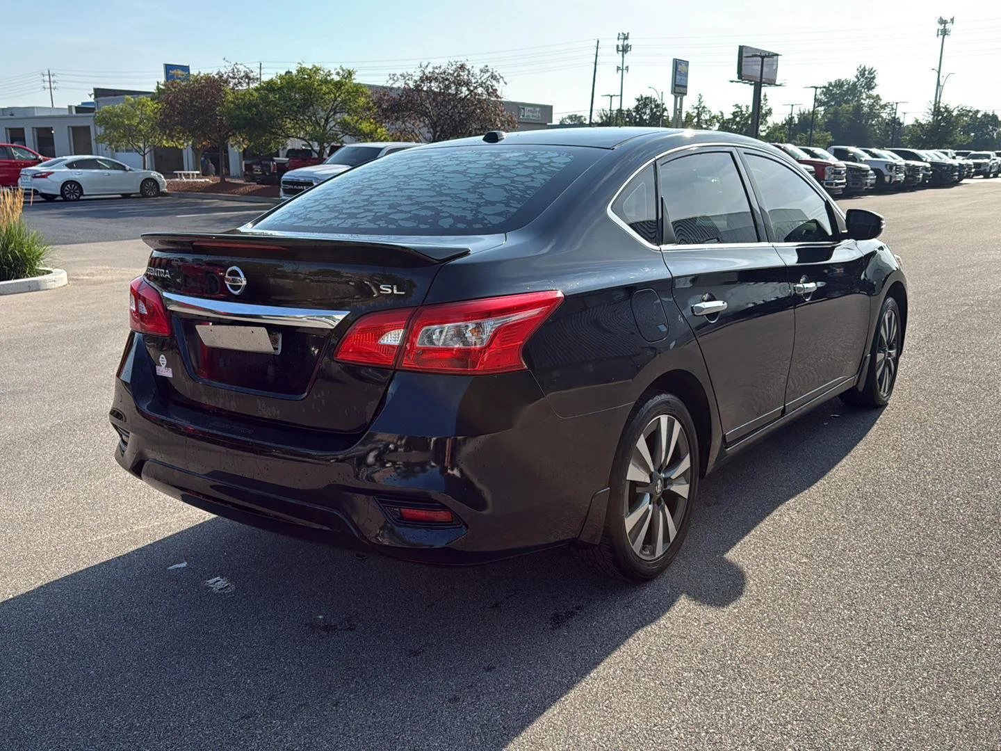 Used 2018 Super Black Nissan SL image 3
