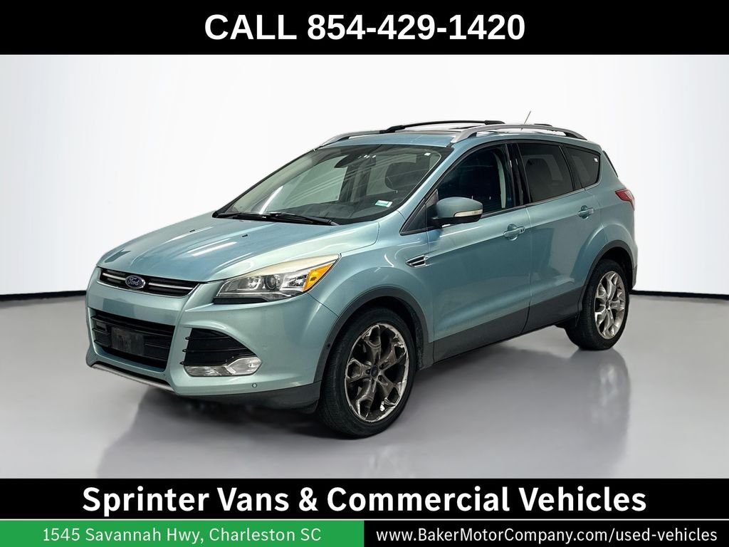 Used 2013 Blue Ford Titanium image 1