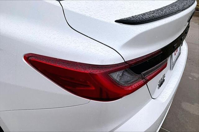 Certified Used 2025 MID BLK/WIND CHILL Toyota  image 28