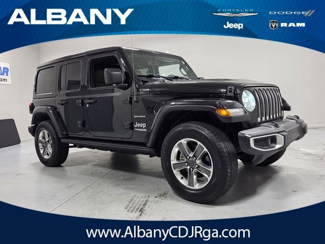 Used 2020 Black Jeep Unlimited Sahara image 1