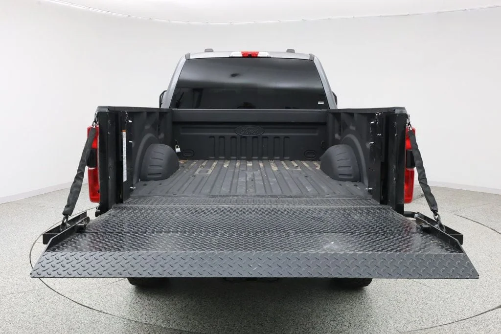 Used 2025 Carbonized Gray Metallic Ford XLT 4WD Crew Cab 6.75