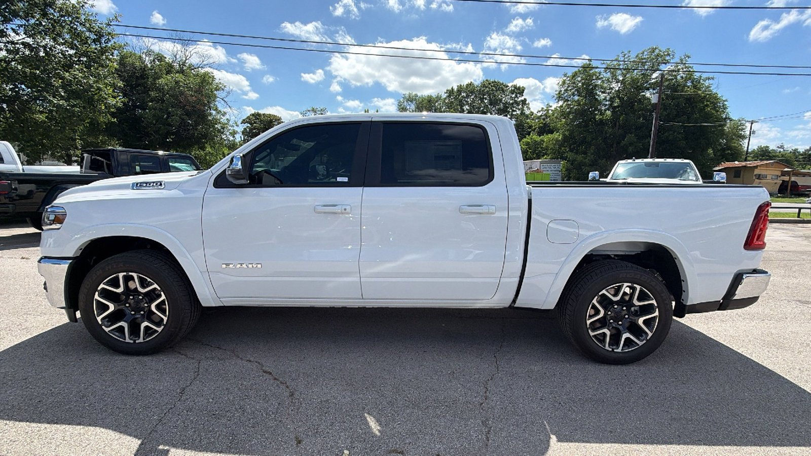 New 2026 Bright White Clear-Coat Exterior Paint RAM Laramie image 8