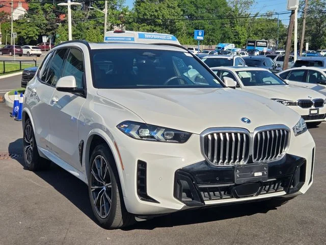 Certified Used 2024 Mineral White Metallic BMW xDrive50e image 3